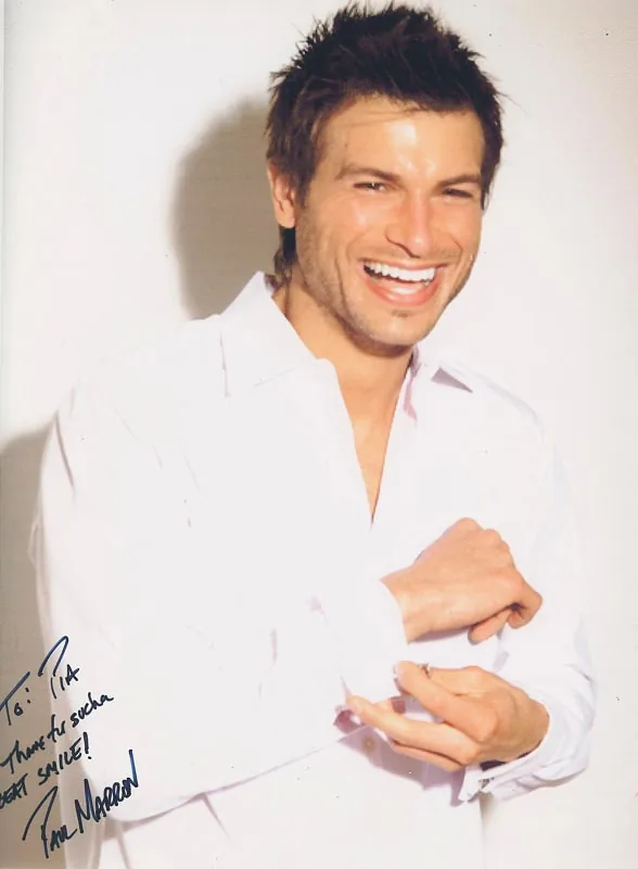 Signed photograph on Dr. Pia's press wall, photograph 3